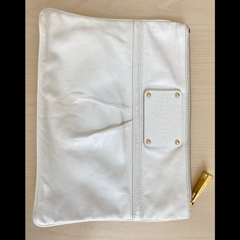 White Marc Jacob's Clutch with gold detailing.  Excellent condition.